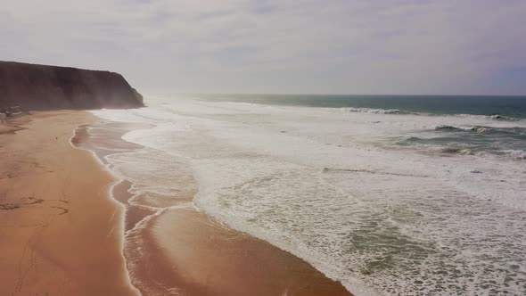 Praia Grande Beach at Sintra, Lisbon, Portugal, on the Atlantic Coast, a Beautiful Sandy Beach with alt