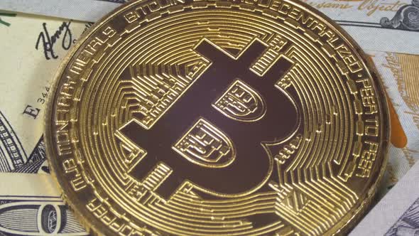 Gold Bitcoin Coin Cryptocurrency BTC Rotate on Background with US Dollars alt