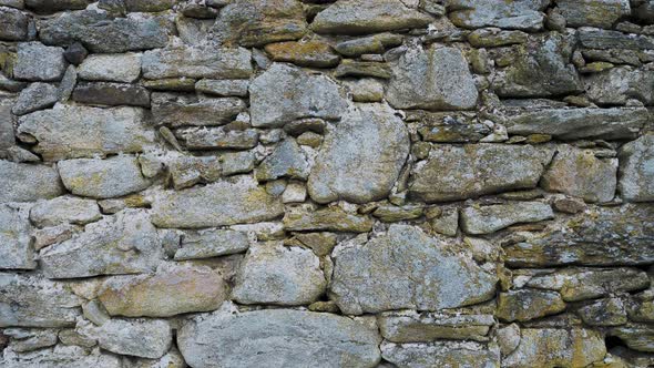 Stone wall. Outdoor background natural stone.