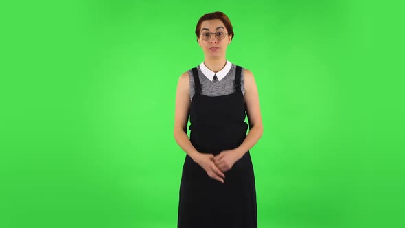 Funny Girl in Round Glasses Is Pointing Herself, Say Who Me No Thanks i Do Not Need. Green Screen alt
