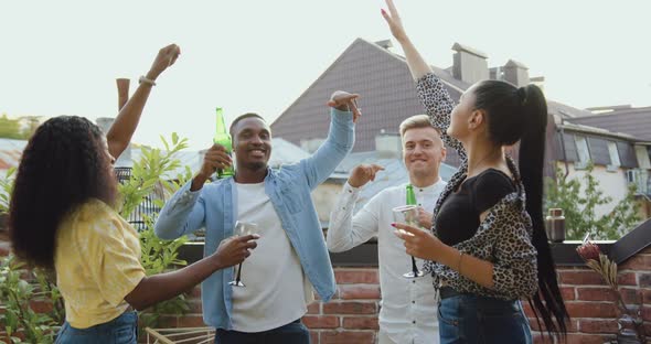Friends which Gethering Together to Celebrate Summer Party on the Balcony alt
