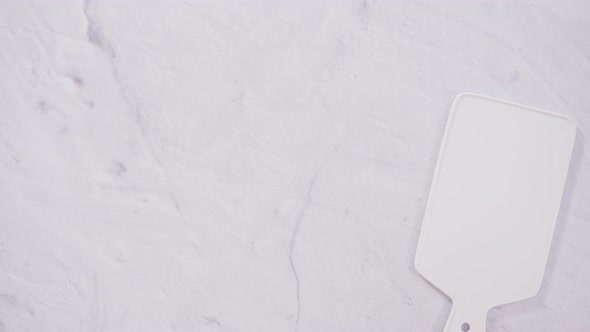 Flat lay. Step by step. Frosting vanilla cupcakes with Italian buttercream icing for Mardi Gras cele alt