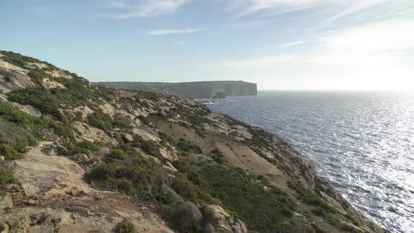 Steep Hills with Greenery near Coastline of Mediterranean Sea in Gozo Island