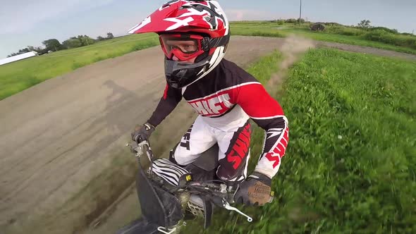 motocross rider twisting his bike in the air gopro swivel cam alt