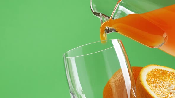 Pouring fresh orange juice