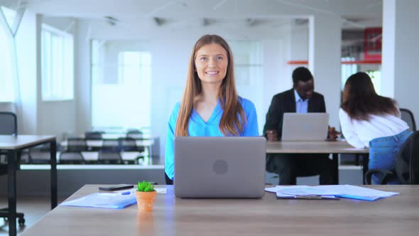 Friendly Manager Shows Greeting Viewers in Open Space Office Worker in Start Up Company alt