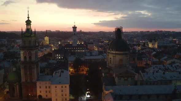 Flight Above the Roofs on Sunrise. Old European City. Ukraine Lviv City alt