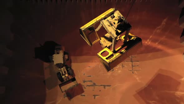 Top Zoom in View of Gantry Crane Lower Down in Bulk Carrier Hold alt