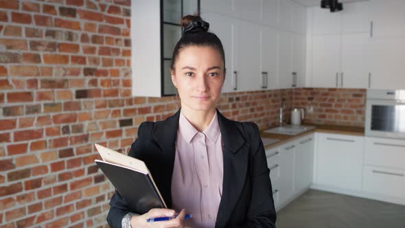 Video portrait of real estate agent in new apartment. Shot with RED helium camera in 8K. alt