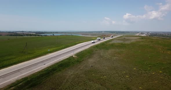 Road Construction Site with Machinery, Bulldozer, Excavation From Above.  Video, Aerial View alt