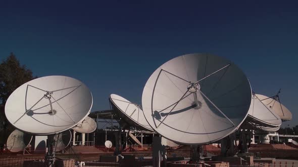 Satellite Dishes on the Roof of a TV Station. alt