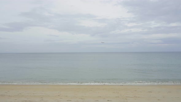 Widebody Airplane Approaching Over Ocean alt