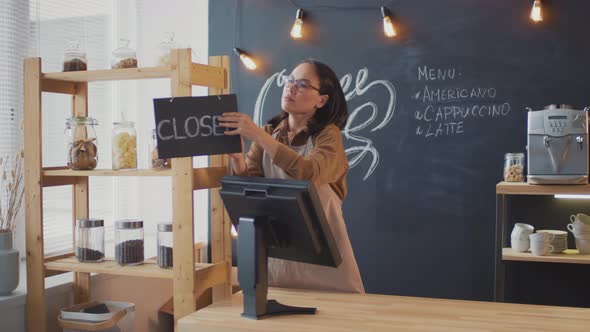 Closing Cafe After Working Day alt