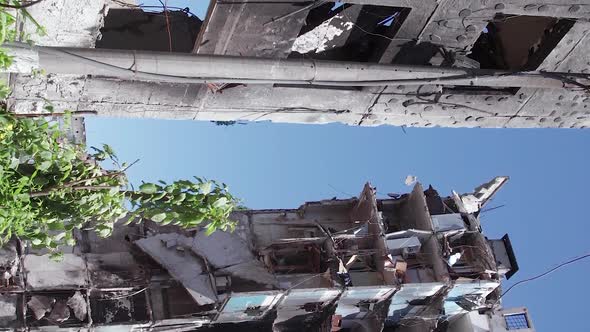Vertical Video of a Destroyed Residential Building During the War in Ukraine alt