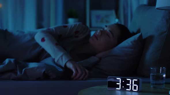 Teenage Girl Sleeping at Home at Night