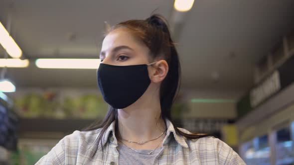 Woman in Protective Mask Walking in Supermarket Groceries Shopping Concept