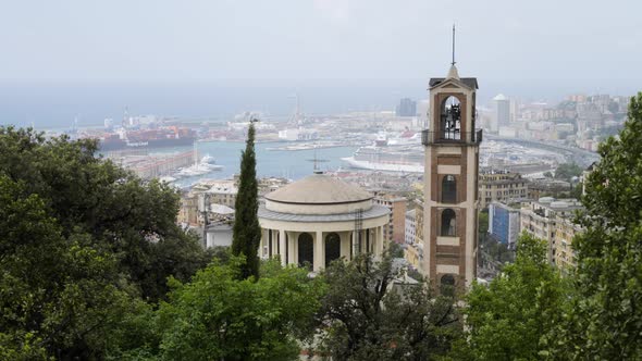 Beautiful bell tower and majestic view of Genoa port, view from above alt