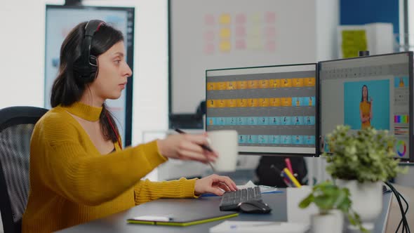 Photo Editor with Headphones Retouching Image Using Stylus Pen alt