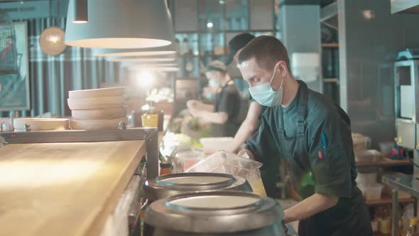 Chefs are Wearing Face Masks While Cooking Meals alt