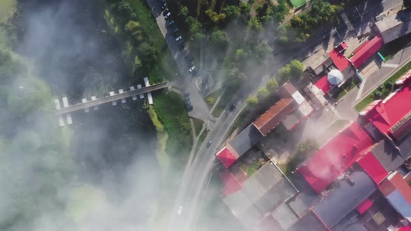 Fog Over the Town in the Morning in Summer