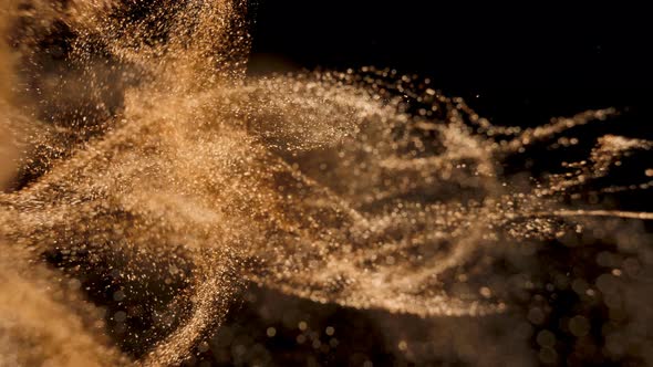 Elegant Detailed and Golden Particles Flow with Shallow Depth of Field Underwater alt