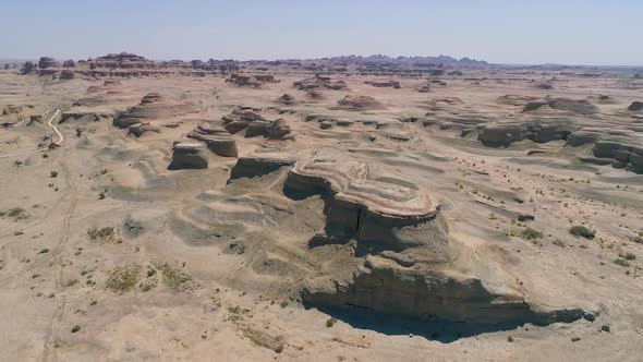 Aerial View of Sandy Rocks Desert in the World Town of Demons of Karamay, Xinjiang, China alt