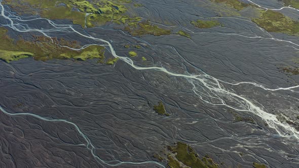 Drone Over Landscape With Dry Riverbed Of Braided River alt