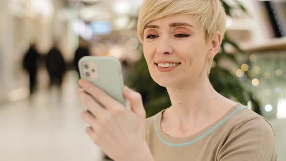 Middle Aged Adult Mature Woman Caucasian Lady 45s Female User with Mobile Phone Online Video Chat alt