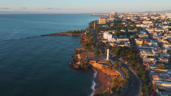 Aerial shot over George Washington avenue, on the boardwalk of Santo Domingo with a view of the fema alt