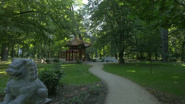 The Chinese garden in Lazienki Park alt