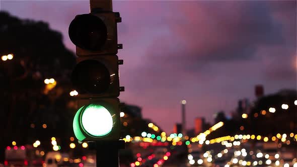 Traffic Light at Sunset in Buenos Aires, Argentina. alt