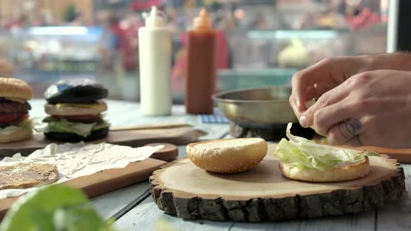 Board with Sliced Burger Bun. alt