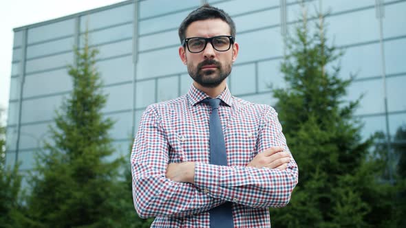 Portrait of Attractive Guy in Formal Wear Standing Outside Looking at Camera alt