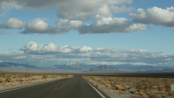 Road Trip Driving Auto From Death Valley to Las Vegas Nevada USA alt