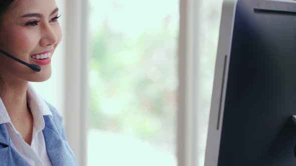 Customer Support Agent or Call Center with Headset Talking to Customer on Phone alt