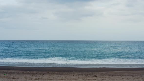 aerial view beach and ocean with cloudy weather alt