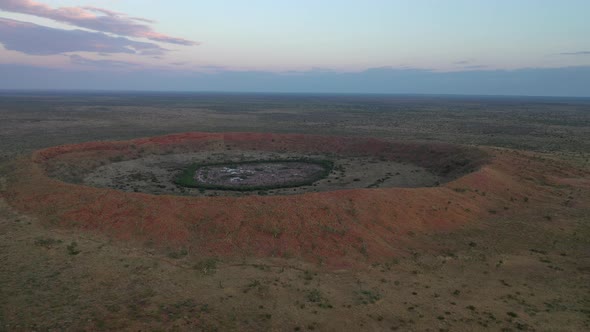 Wolfe Creek Meteorite Crater Golden Hour Sunset, Western Australia 4K Aerial Drone