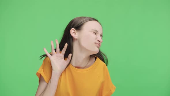 Young Girl Imitate Huddle in Public Transport and Indignantly Press Their Faces and Hands Against alt