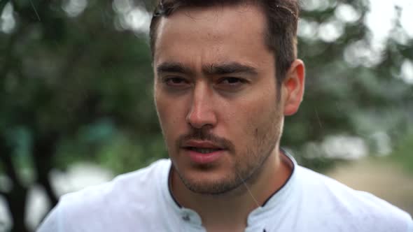 Close Up Bearded Man Seriously Looking at Camera alt