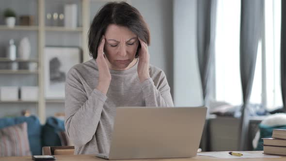 Headache, Tense Old Senior Woman Working on Project alt