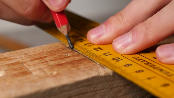 Manual ruler wood markings for nail alignment alt