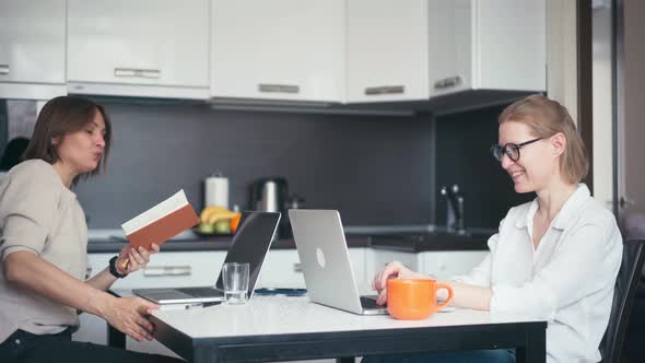 Two Young Women Freelancers Remote Employee Working From Home alt
