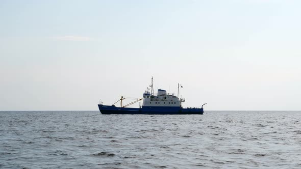 Old ship anchored at lake, side view of Norilsk ferry-icebreaker alt