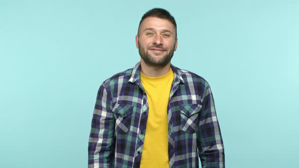 Slow Motion of Handsome Smiling Adult Man Nodding and Smiling Listening to Conversation and Agree alt