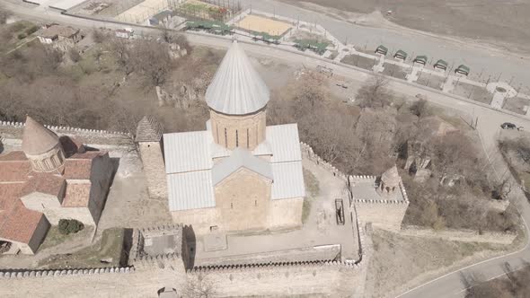 Aerial view of old Ananuri Fortress with two churches and picturesque view on river. Georgia 2021 alt