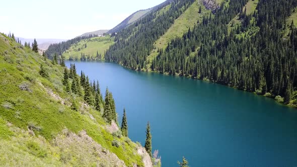 Kolsay Lake Among Green Hills and Mountains alt