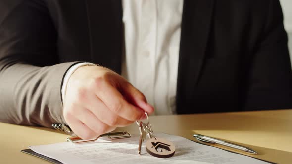 Real Estate Agent Holding Home Keys Closeup Man Realtor alt