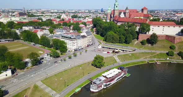 Aerial View of Vistula River and Tourist Boats near Wawel Castle Krakow, Poland