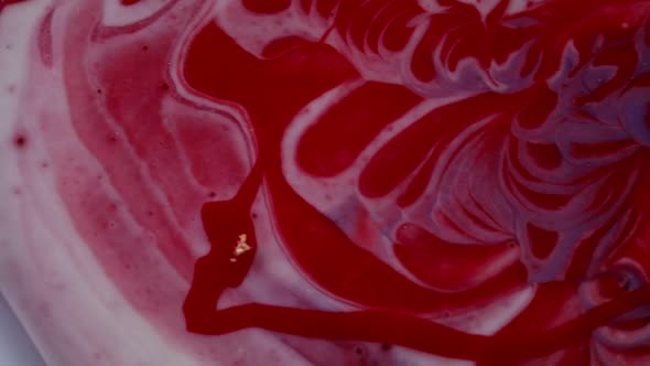 Red and Purple Mirror Icing on a Round Frozen Mousse Cake alt