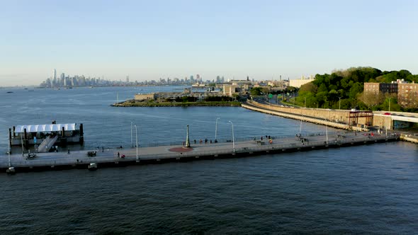 Aerial Shot of a Pier Next to an Urban Neighborhood (Bay Ridge, Brooklyn, New York) alt